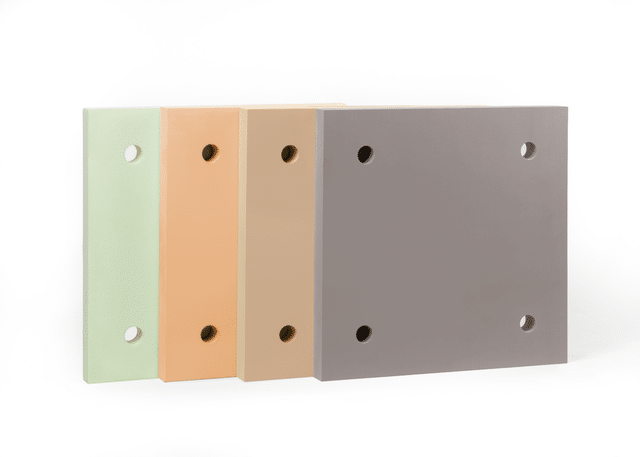 Four Armatherm 500 polyurethane thermal break pads shown in different density grades used to reduce thermal bridging at structural connections in wall, floor and roof applications