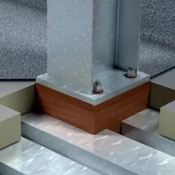 Parapet roof penetration with insulation material applied